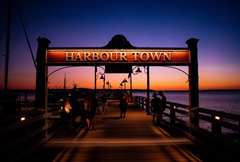 View of Harbour Town lighthouse at sunset in Hilton Head South Carolina. An excellent spring break destination.