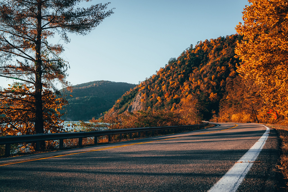 a highway during fall near a lake in Gatlinburg, Tennessee