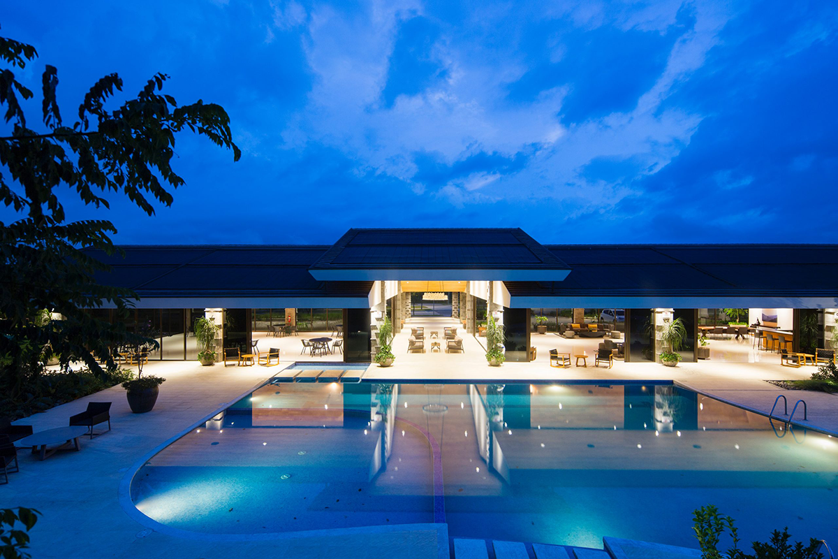 vacation resort seen from night light and pool reflection