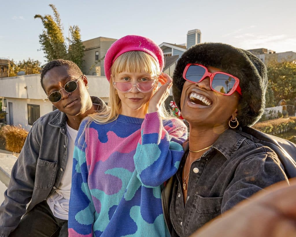 Three friends posing for a photo.