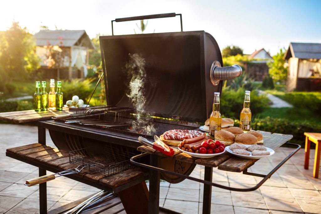 Grill with steaks on a plate