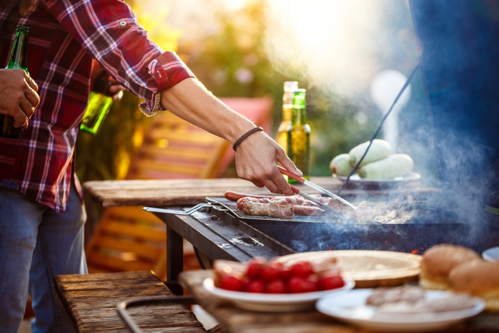 Friends grilling in the backyard